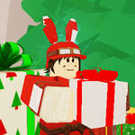screenshot of tinker holding a present